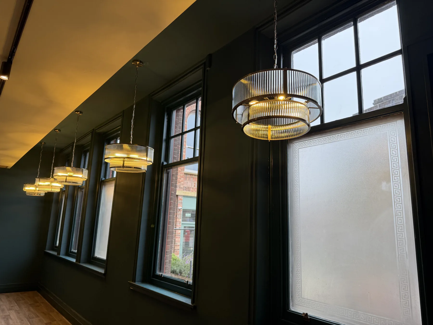 Feature pendants along the window wall