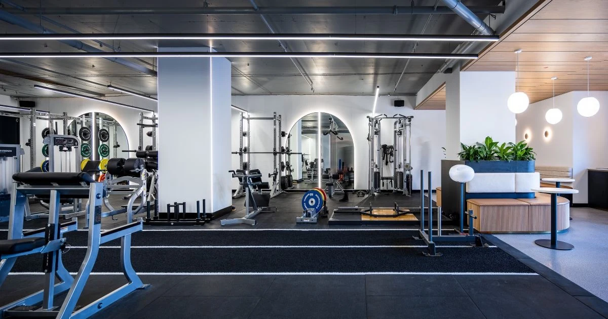 Premium gym with running track and strength training zones