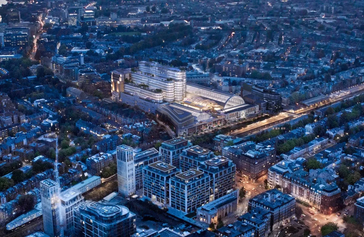 CGI aerial view of the Olympia London redevelopment at dusk