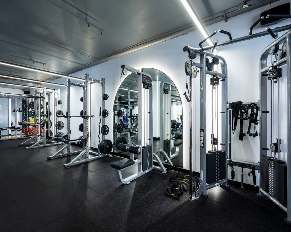 Premium gym and health club interior with arched mirrors