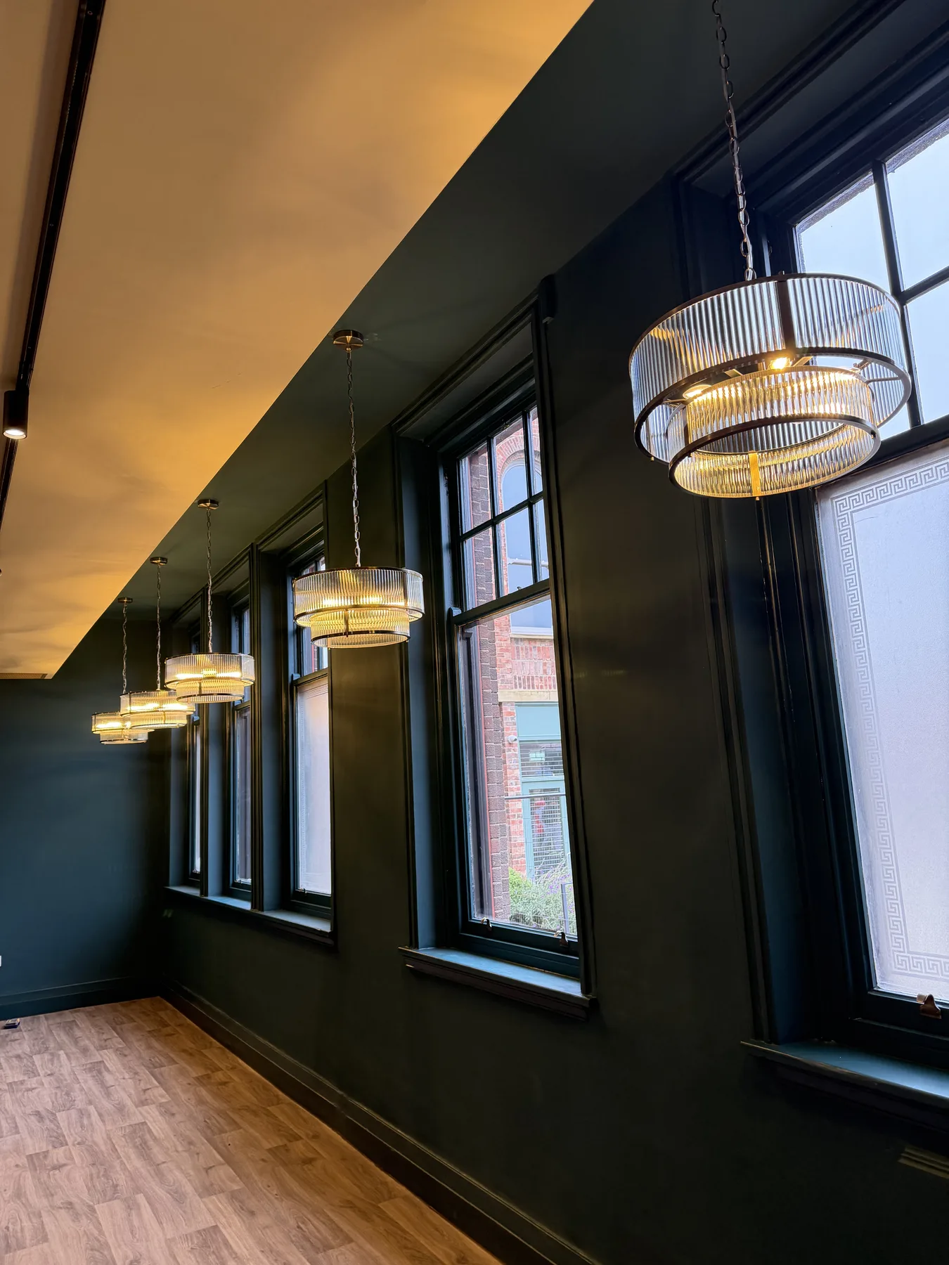 Sash windows and glass pendants in the dining room