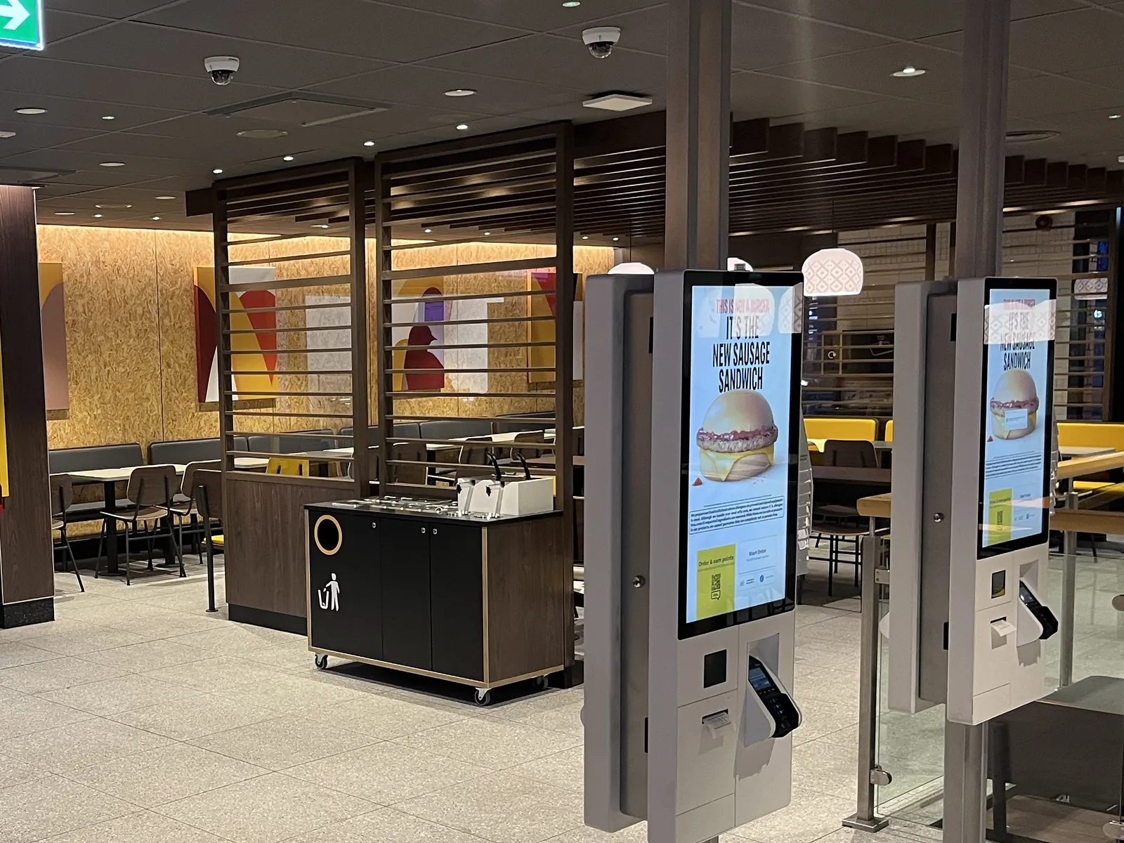 Ordering kiosks, timber screens and dining area