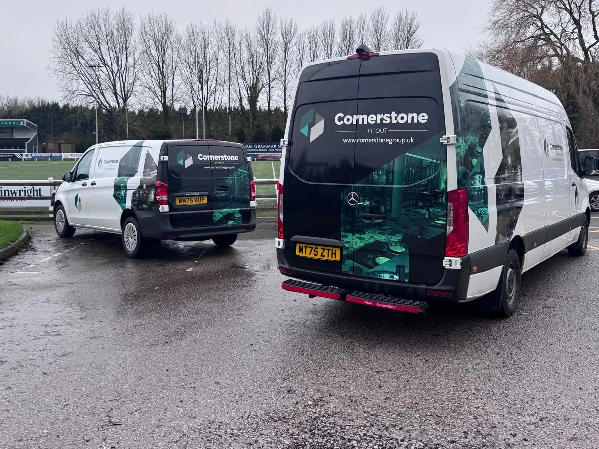 Our vans beside the pitch at Preston Grasshoppers