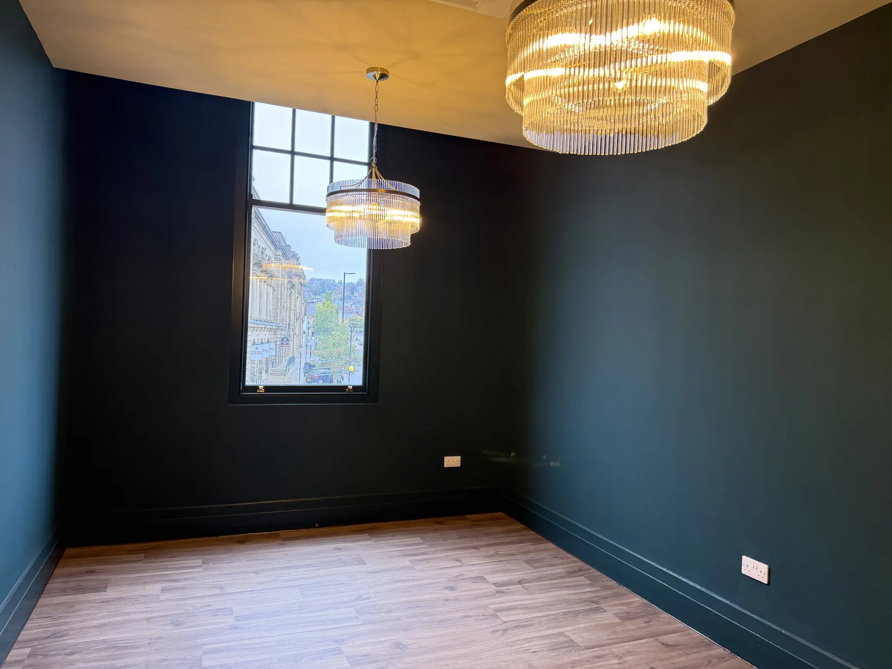 Private room in deep blue with crystal chandeliers