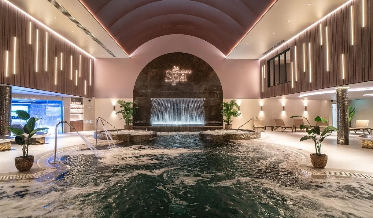 The Woodland Spa hydrotherapy pool and waterfall wall